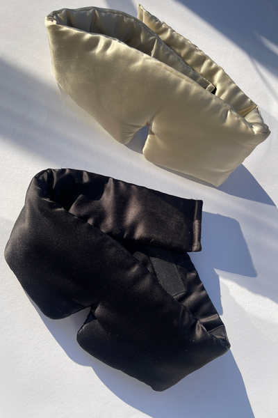 “Plush padded silk sleep mask with adjustable elastic strap, ideal for pressure-free sleep and lash protection.”