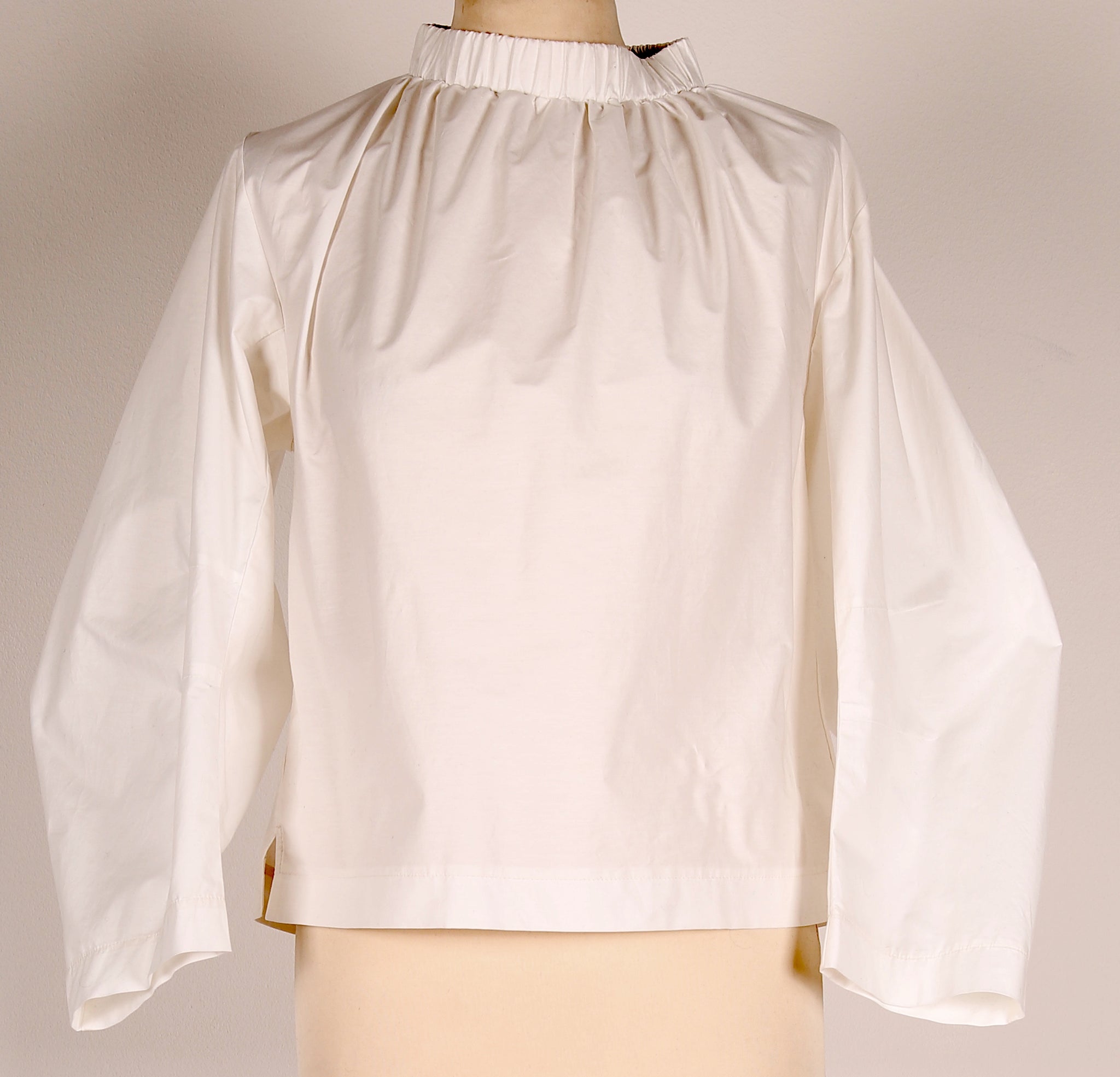 White Blouse With a Gathering
